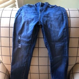 Lightly distressed medium wash jeans